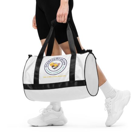 A woman carrying an All-over print gym bag.