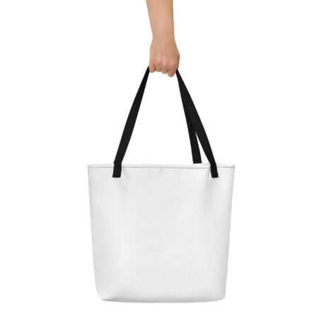An All-Over Print Large Tote Bag named "All-Over Print Large Tote Bag" being held in a hand.