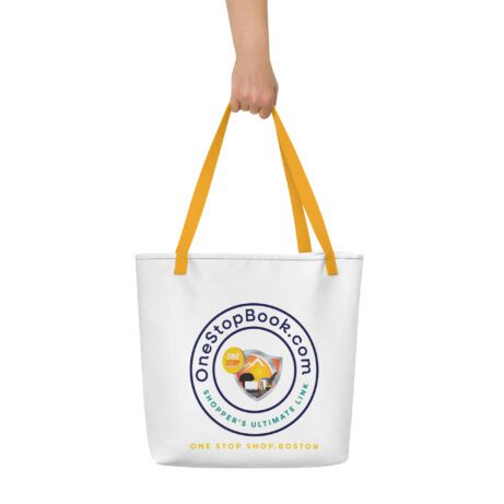 A woman's hand holding an All-Over Print Large Tote Bag with yellow handles.