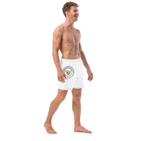 A man wearing Men's swim trunks with a logo on it.