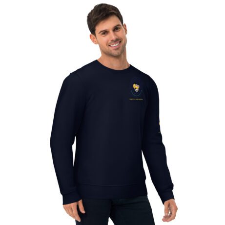 A man wearing a navy Unisex eco sweatshirt with an embroidered logo.