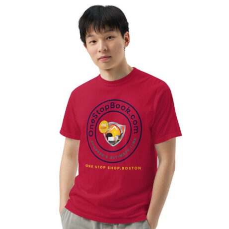 A young man wearing a red Unisex garment-dyed heavyweight t-shirt with a blue and yellow logo.