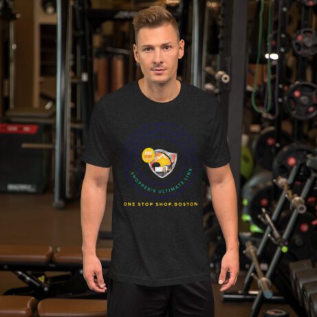 A man standing in a gym wearing a black Unisex T-shirt.