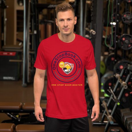 A man standing in a gym wearing a red Unisex t-shirt.